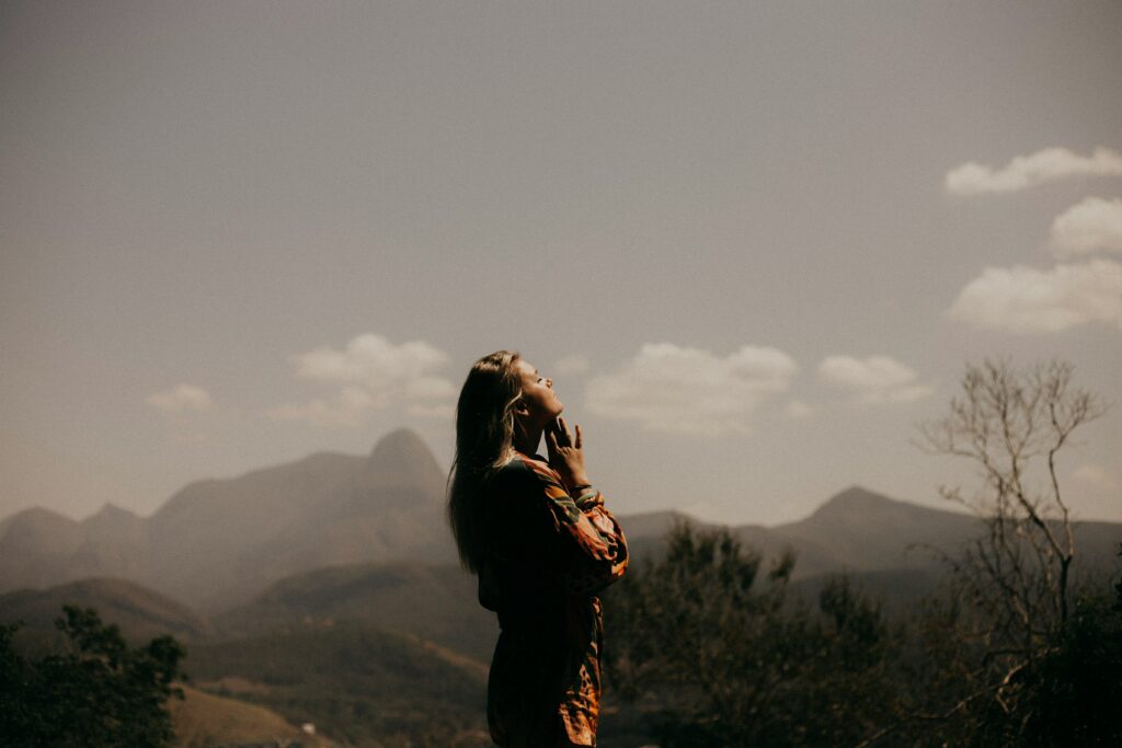 a serene image of a woman outside healing from trauma